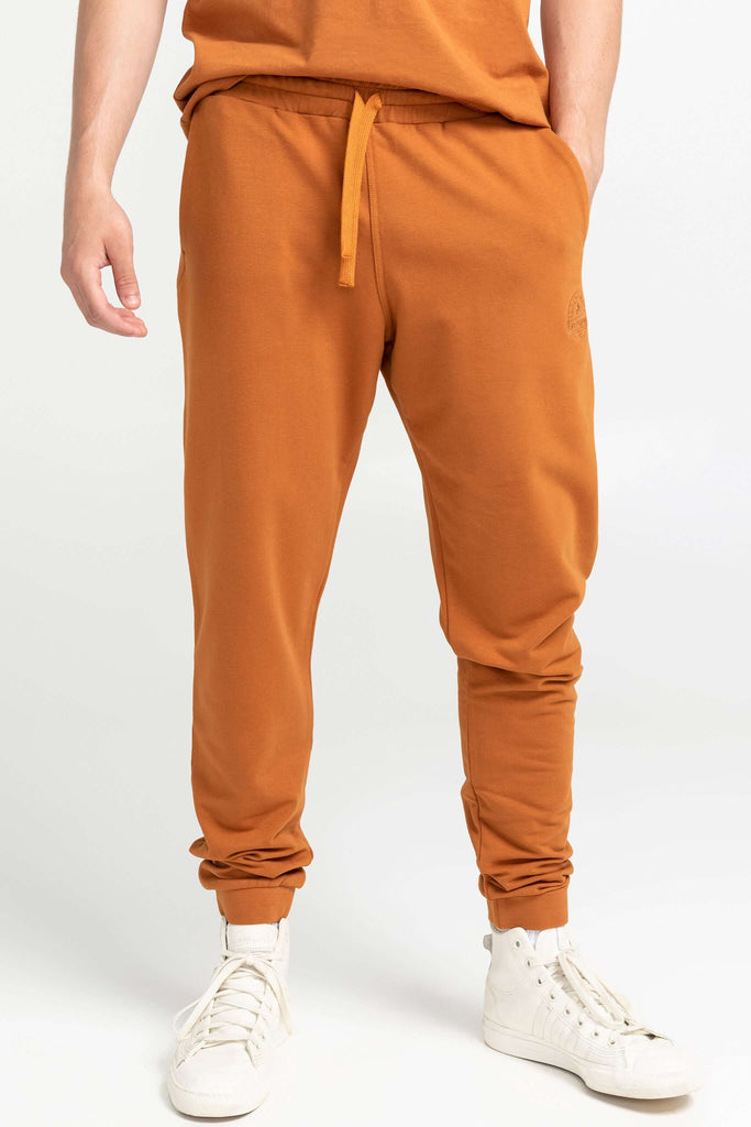 Unisex tapered jogger with shredded backing